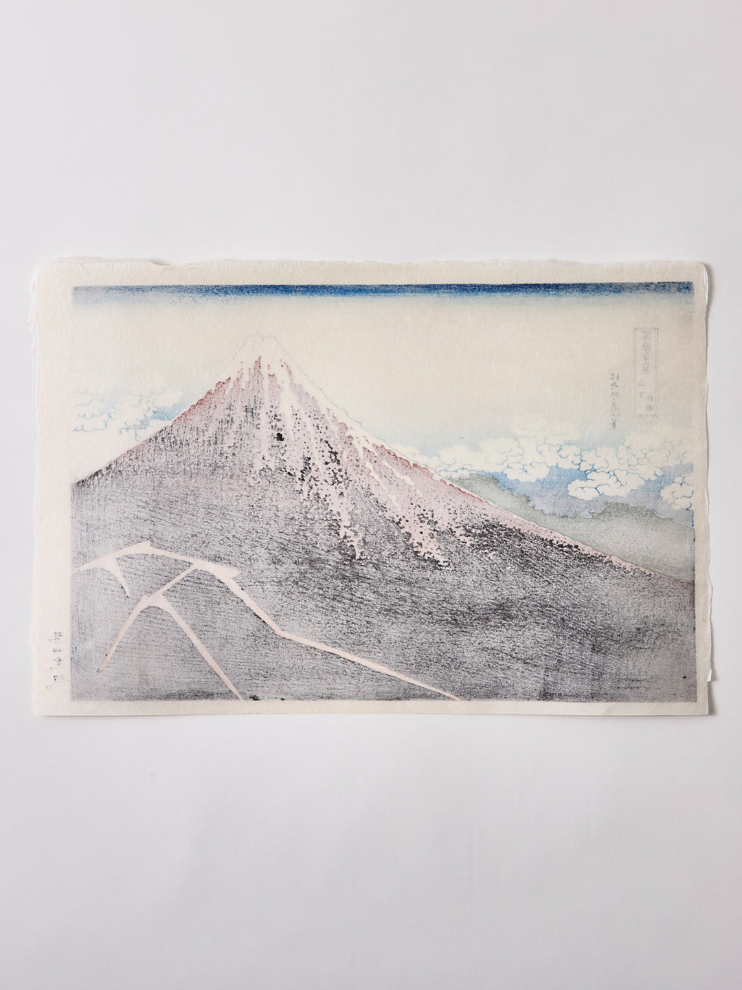 Thunderstorm Beneath the Summit by Hokusai Katsushika - Woodblock